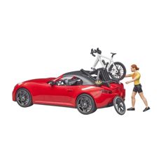Roadster with road bike and cyclist