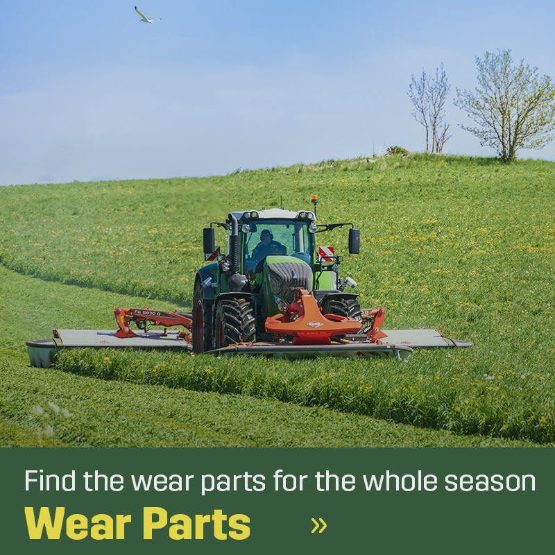 Tractor with front and side-mounted mower working in a grass field during harvest. Sagros wear parts and spare parts are used for mowing and forage harvesting in agriculture.